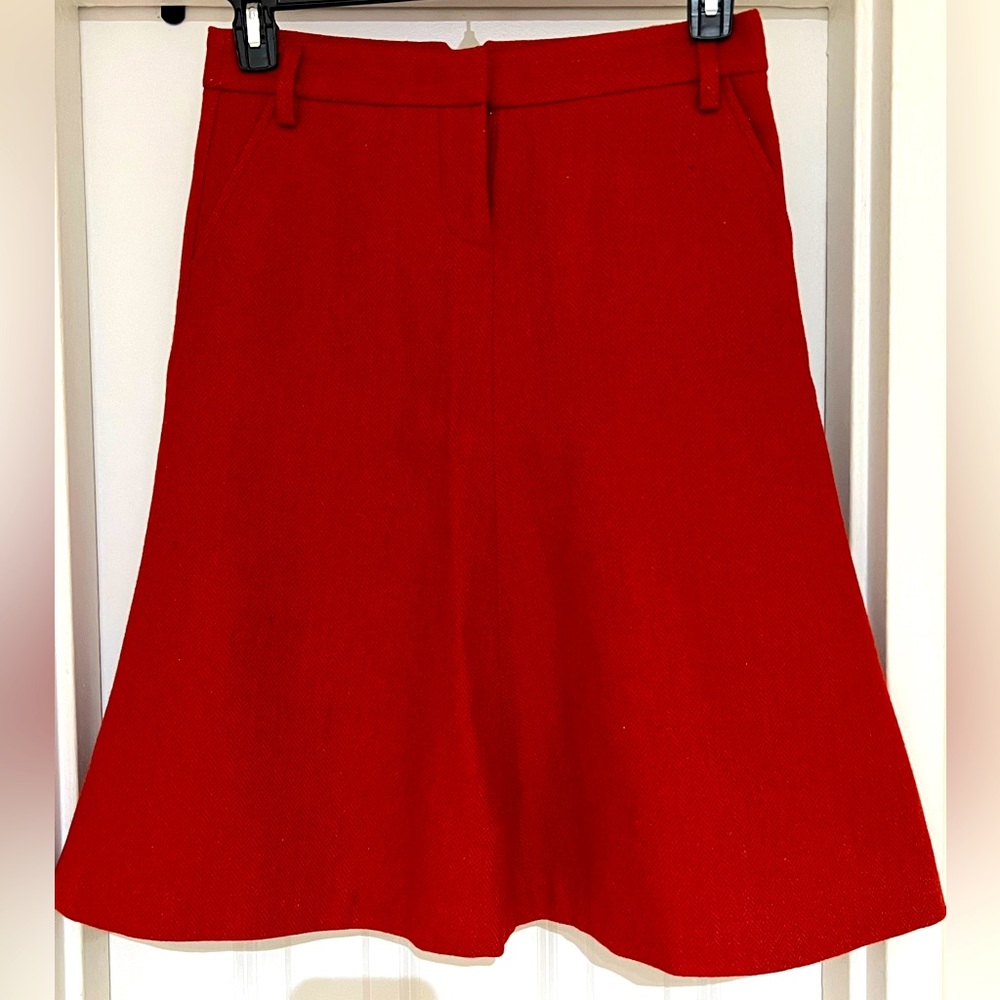 A-Line knee length skirt and 100% Wool.